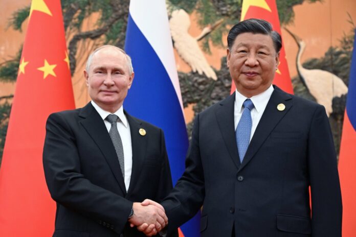 Prezydenci Rosji Władimir Putin i Chin Xi Jinping. Foto: PAP/EPA