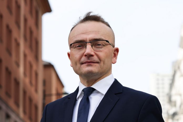 Marek Woch.
