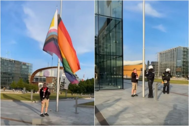 Polski kibic ściąga flagę LGBT w Helsinkach.