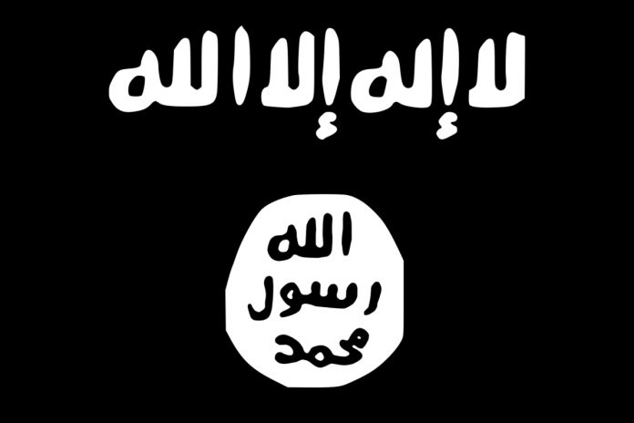 Flaga tzw. Państwa islamskiego. Obrazek ilustracyjny.
