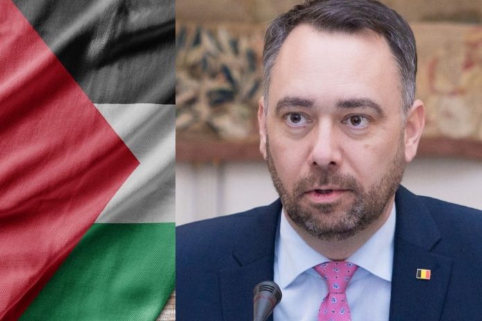 Flaga Palestyny oraz minister spraw zagranicznych Belgii Maxime Prevot