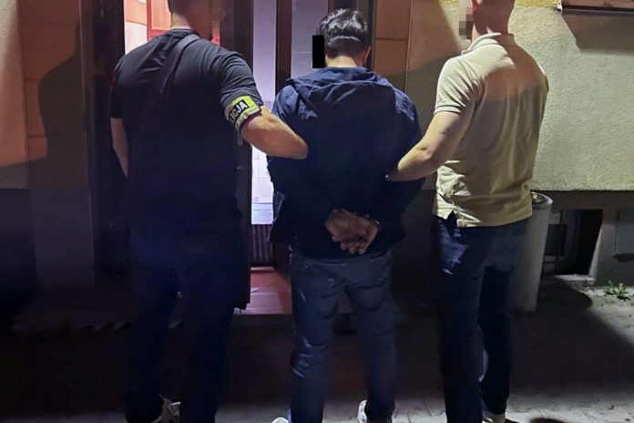 imigrant azer policja